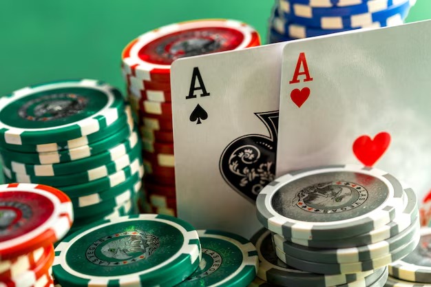 Close-up of live dealer hands managing poker table