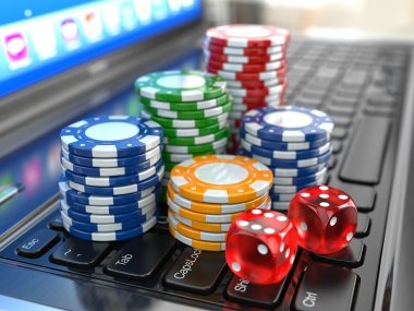 Overhead view of poker table with five community cards